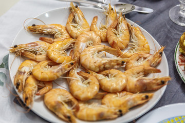 Close-up of a large plate of prawns, freshly cooked