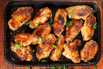 Chicken wings on barbecue grill. Tasty, beautiful and appetizing.