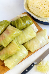 Cabbage rolls stuffed with meat and rice prepared for cooking.