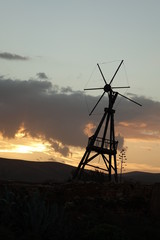 Fototapeta na wymiar sunset with windmill