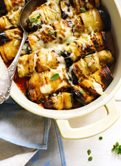 Baked eggplant with tomato sauce and herbs