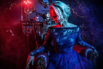 lady vamp in armchair