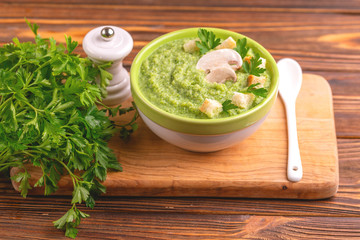 Fresh tasty pureed broccoli soup with vegetables. Healthy food