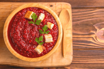 Bright fresh tasty pureed tomato soup with ingredients