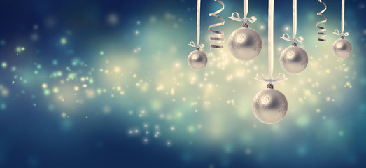 Collection of Christmas baubles in snowy night