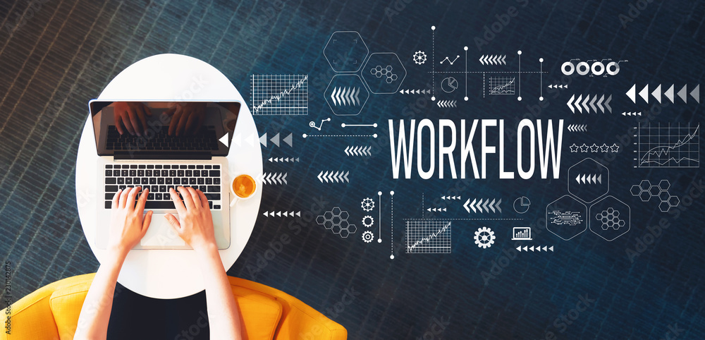 Poster workflow with person using a laptop on a white table