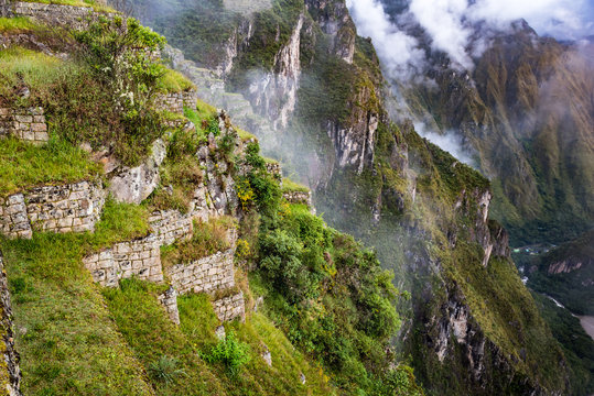 Steep cliffs along the west side of Machu Picchu