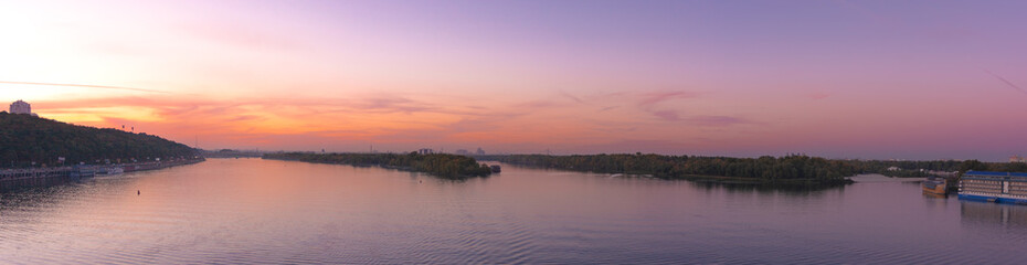 Sunset moments in Kyiv, view of the Dnieper river.