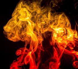 Fototapeta premium Colored smoke on black background