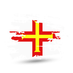 Obraz premium Grunge brush stroke with Guernsey national flag