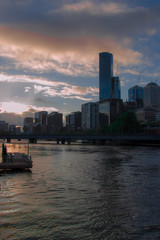 Fototapeta premium beautiful sunset with building and river in melbourne city australia