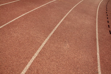 Fototapeta premium red plastic runway in a sports ground, in Beijing, China
