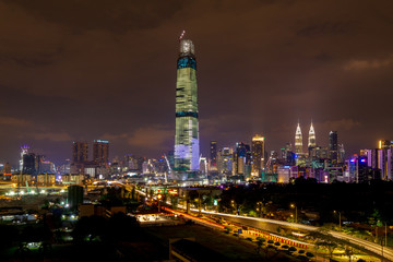 View of majestic sunset over Exchange 106 tower (formerly known as TRX Signature). The tower still...