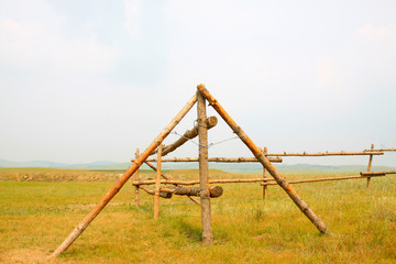 Fototapeta premium Wooden fence in the grassland, China
