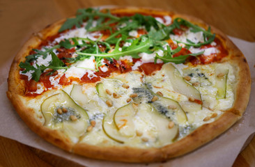 Macro photo of delicious pizza with pear and cheese