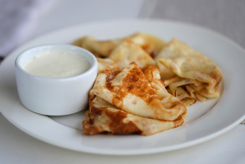 Macro photo of thin delicious pancakes with vanilla