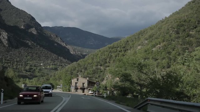 Lleida, Spain. Cars Driving In Beautiful Asphalt Freeway, Motorway, Highway N-260 Against The Background Of Southern Pyrenees Mountains Landscape