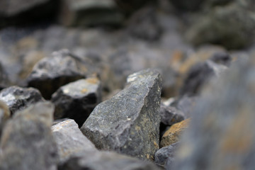 Rock pile, rubble tailings, close with shallow depth of field