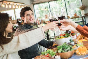 Dinner for Christmas party with family and friend with turkey, salad, steak and red wine.