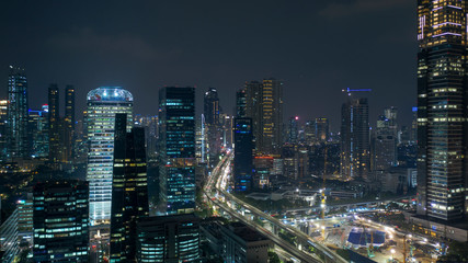 Obraz na płótnie Canvas Aerial scenery of Jakarta skyline at nighttime