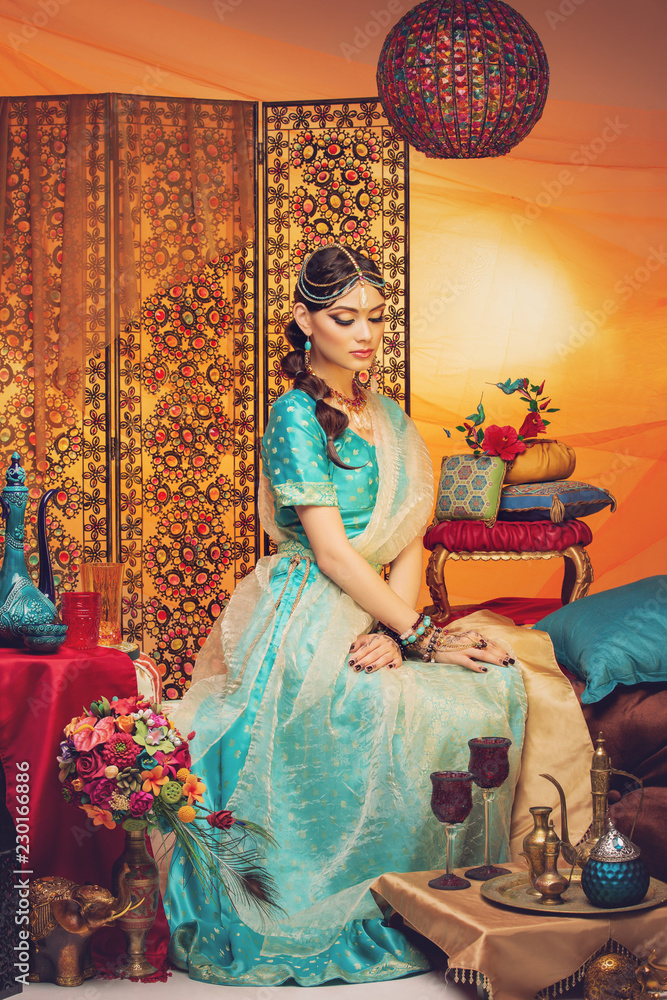 Wall mural beautiful arabic style bride in ethnic clothes