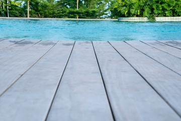 Closeup of wooden floor of swimming pool