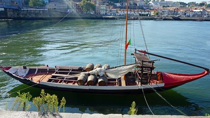 Obraz premium douro river in porto with colorful traditional boats