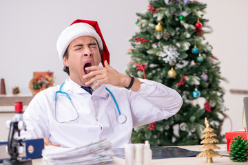 Doctor on the shift on christmas eve