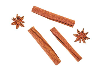 Cinnamon sticks with anise stars isolated on white background. Top view.
