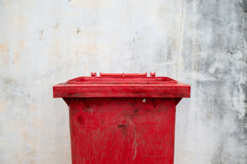 closeup dangerous trash bin with soft-focus and over light in the background