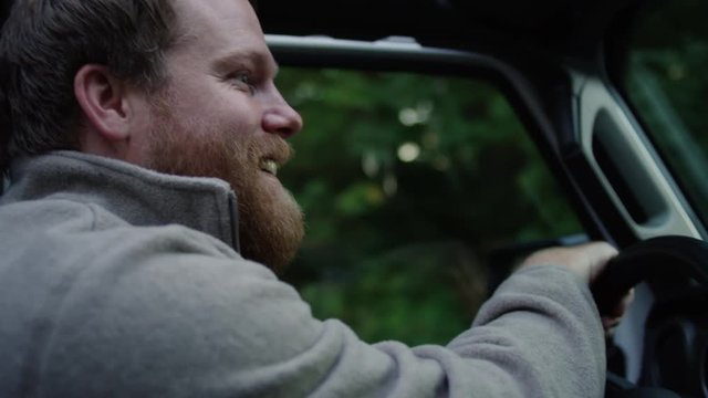 Profile Of Happy Man Driving In Countryside, Slow Motion