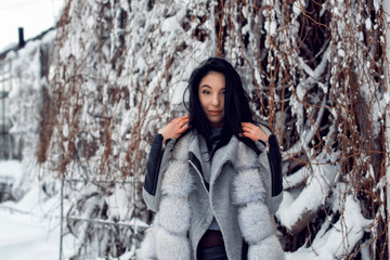 Winter walk with a bright brunette