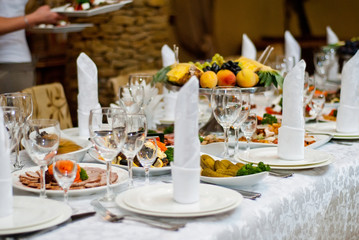 delicious dishes on the table in the restaurant. serving table.