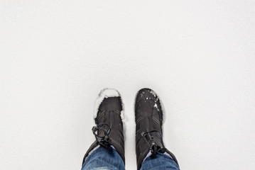 Selfie of boots in the snow, winter concept