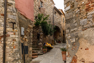 Colorful narrow streets in the medieval town of Campiglia Marittima in Tuscany - 9