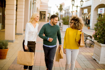 Young multiracial people in shopping