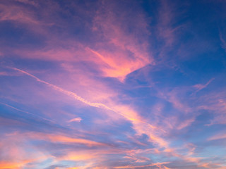 Beautiful pastel cloudy sunset with blue sky 