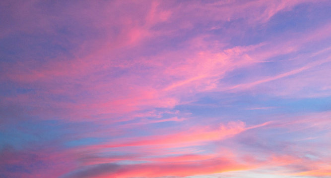 Beautiful pastel cloudy sunset with blue sky 