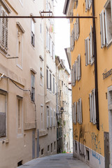 Fototapeta na wymiar Narrow street in Trieste, Italy