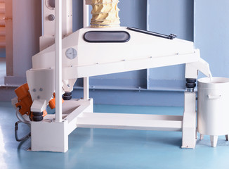 Modern new equipment at the plant for the processing of grain, cleaning of grain from litter and foreign debris, industry, processing