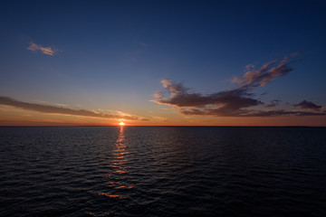 colorful dramatic sunrise in the sea. view from ferry