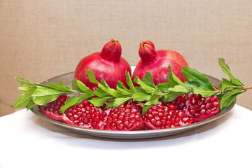 Ripe red pomegranate grown in the garden 