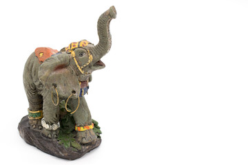 Statuette of an Asian elephant on a white background