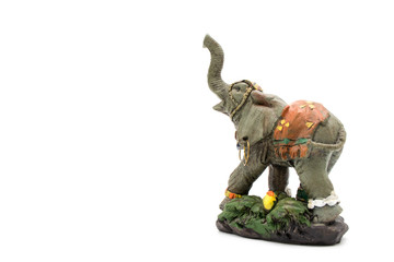 Statuette of an Asian elephant on a white background