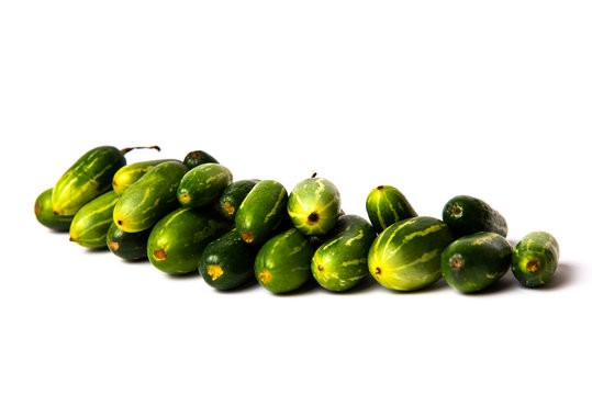 Pointed gourd vegetables on white background