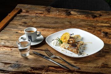 Breakfast with coffee and pancakes