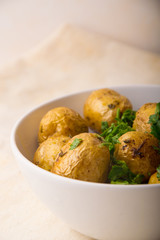 delicious and tasty baked potatoes with greens