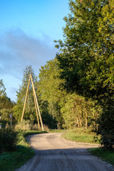 Fototapeta premium power line electricity poles in country