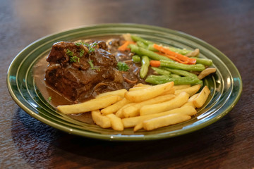 Stewed beef steak with selected focus