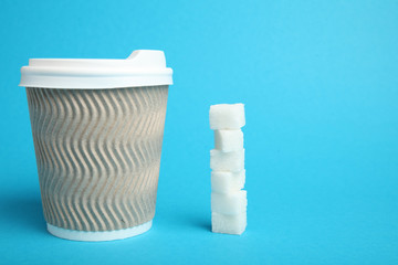 Sweeten coffee, pouring. Sugar drink in takeaway cup.
